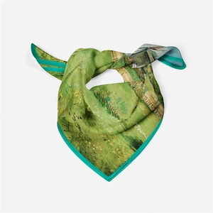 Detail of green silk scarf featuring Van Gogh style wheat field and cypress pattern
