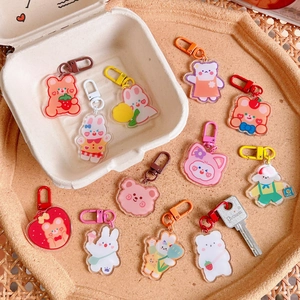 Collection of cute acrylic bear and rabbit keychains with colorful metal D-ring clips