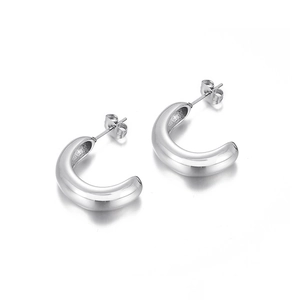 Polished silver C-shaped hoop earrings in stainless steel with minimalist bold design