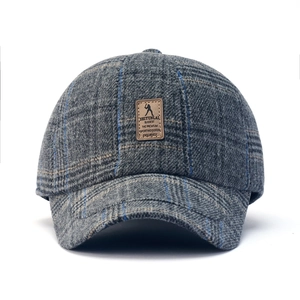 Winter grey plaid wool baseball cap with thick flannel texture and leather logo patch