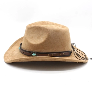Detail view of tan faux suede cowboy hat with turquoise and metal studded leather band