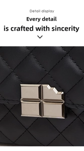 Detailed macro view of black quilted leather bag featuring a unique chocolate block metal clasp