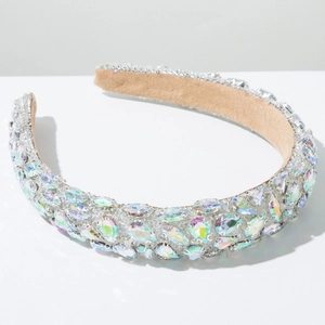 Detail of baroque headband with colorful teardrop rhinestones and beige suede lining