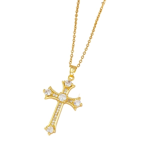 Gold plated cross pendant necklace with zircon stones on a white background