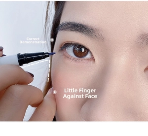 Close-up of fine tip blue eyeliner application with stable hand technique guide