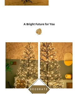 Detail of warm LED black birch tree branches with glowing warm lights for holiday decor
