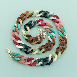 Detailed view of colorful 120cm acrylic chain straps with golden metal lobster clasps