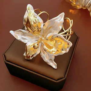 Artistic lily flower hollow open cuff bracelet with gold and white pearl finish