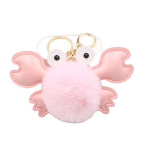 Pink plush crab keychain with gold ring and PU leather claws on white background