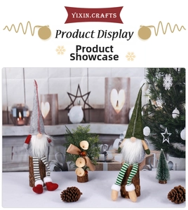 Detail of Swedish forest gnomes with striped long legs sitting on rustic wooden logs
