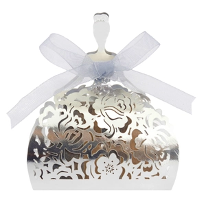 Macro detail of laser-cut purple floral pattern on silver paper wedding favor box
