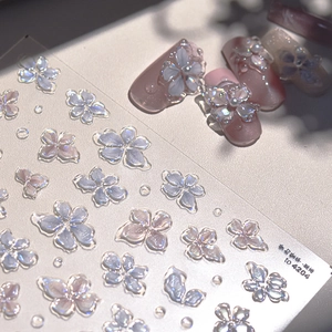 Macro view of 3D jelly flower nail stickers with holographic iridescent laser finish