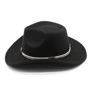 Detail of black wide brim cowboy hat with a textured tricolor braided band detail