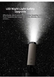 Close-up of handle featuring integrated LED night light and power button on umbrella