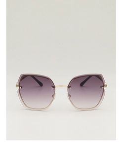 Detail of rimless polygon sunglasses with purple gradient lenses and gold metal temples