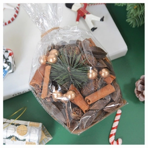 Mix of gold pine cones, cinnamon sticks and leaves for Christmas DIY crafts