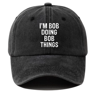 Washed cotton vintage baseball cap in dark grey with I'M BOB DOING BOB THINGS print