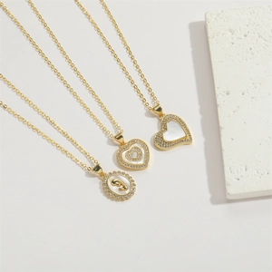 Gold plated 14K heart shell necklace set with butterfly pendant and white zircon stones