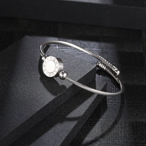 Silver Roman numeral cable bangle in stainless steel with white shell inlay for women