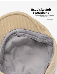 Detail view of khaki beret with soft cotton inner sweatband and corduroy texture