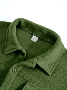Close-up of olive green fleece shirt collar with resin button and M size label detail