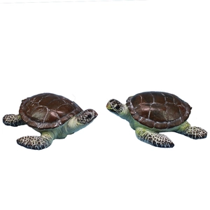 Pair of realistic sea turtle resin figurines with textured shells and hand-painted details