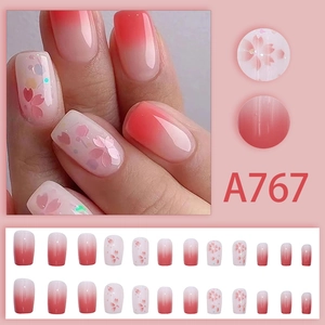 Sweet pink gradient press-on nails set with cherry blossom patterns and 24-piece box