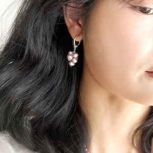 Elegant cluster of purple freshwater pearl drop earrings on a silver hook for women