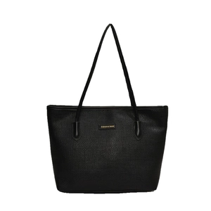 Minimalist black tote bag with cross-grain texture and gold emblem on white background