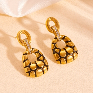 Gold stainless steel turtle pattern earrings with crystal pavé and black enamel inlay