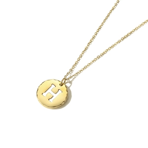 Gold plated stainless steel necklace featuring a round pendant with hollow H initial