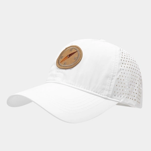 Detail of white quick-dry baseball cap featuring laser-cut vents and compass patch