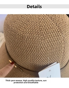 Dettaglio cappello alla pescatora kaki all'uncinetto con cintura in pelle e fibbia d'oro