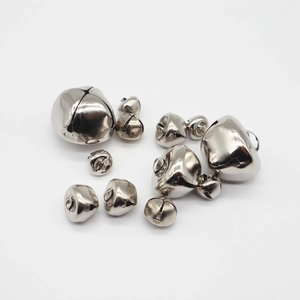 Various sizes of polished nickel silver cross bells for collars and DIY crafts