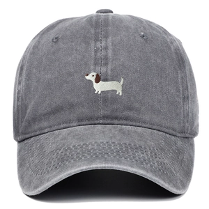 Close-up of embroidered dachshund logo on dark grey washed cotton baseball cap