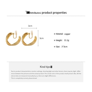 Detailed technical view of twisted gold-finish brass hoop earrings with 3cm diameter size
