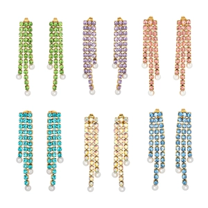 Set of layered 18k gold plated stainless steel pearl earrings with green zircon tassels