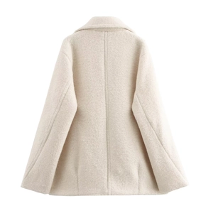 Back view of cream double-breasted coat featuring rich wool blend tweed texture