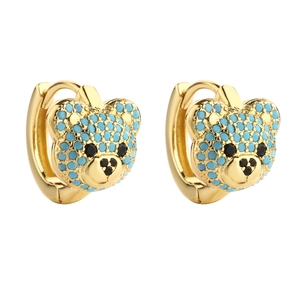Golden teddy bear hoop earrings featuring vibrant turquoise blue pave rhinestones