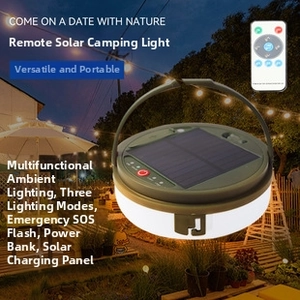 Solar camping light with remote control showing green casing and solar panel on top