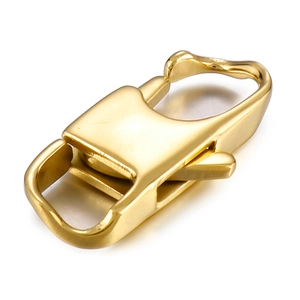 Macro detail of golden mirror finish stainless steel spring clasp for jewelry and bags