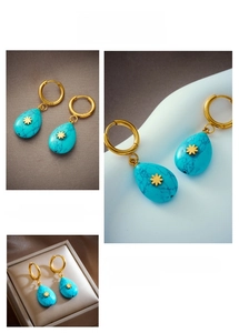 Detail of vintage teardrop turquoise earrings with gold floral motif and hoop drop