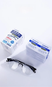 Detailed view of individual anti-fog lens cleaning wipes with an eyeglass and the retail box