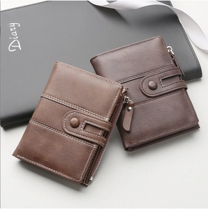 Detail of short PU leather men's wallets showing vintage texture and secure metal zipper