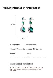Detail showing dimensions of green drop earrings with silver needle and rhinestones