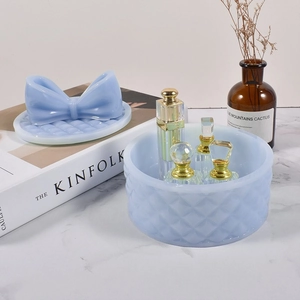 Detail of light blue bow and diamond pattern on silicone storage jar mold for DIY crafts