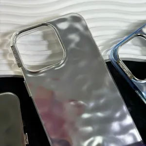 Close-up of ripple texture iPhone case with metallic silver finish and lens frame detail