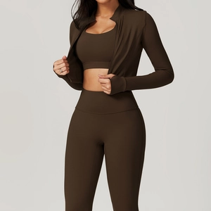 Deep brown yoga 3-piece set featuring slim-fit zip jacket, sports bra and high-waist leggings