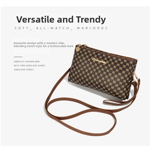 Detailed view of the brown polka dot pattern and golden zippers on this crossbody bag