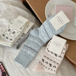 Fair Isle pattern cotton mid-calf socks with heart motifs in assorted pastel colors